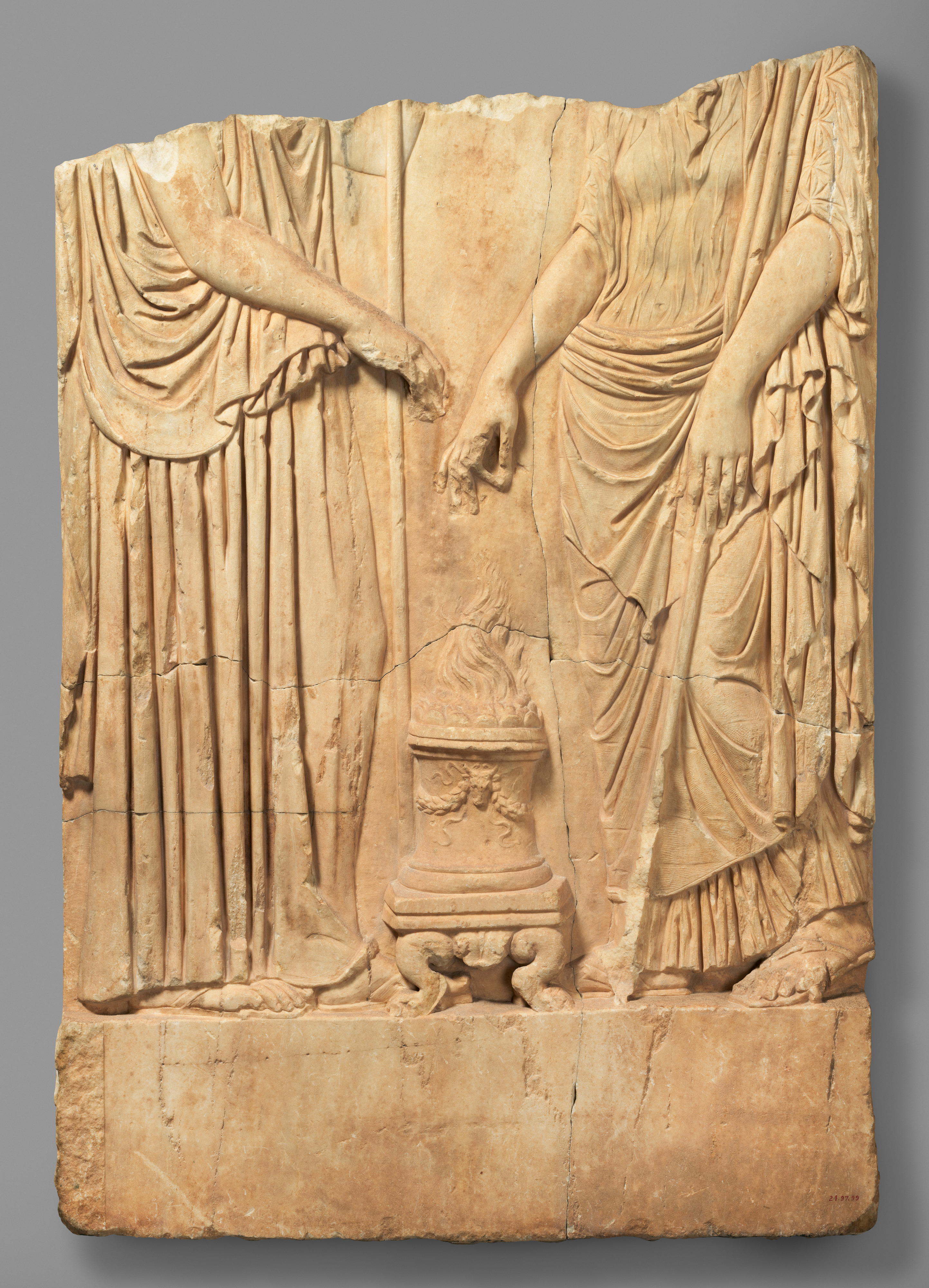 Lower part of a marble relief with two goddesses